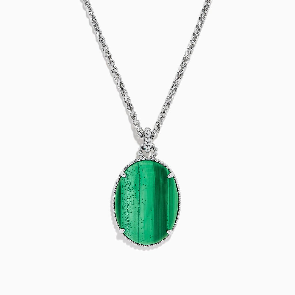 The 925 Sterling Silver Malachite Oval Pendant showcases a large oval malachite with dark and light streaks, set in a decorative silver bezel on a sterling silver chain.