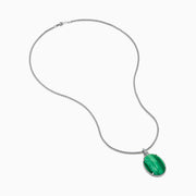 The 925 Sterling Silver Malachite Oval Pendant showcases a large oval malachite with dark and light streaks, set in a decorative silver bezel on a sterling silver chain.
