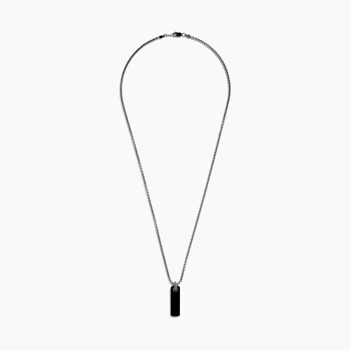 The Men's Sterling Silver Onyx Dog Tag Pendant features a simple rectangular onyx set in sterling silver, suspended from a chain and displayed against a plain white background.