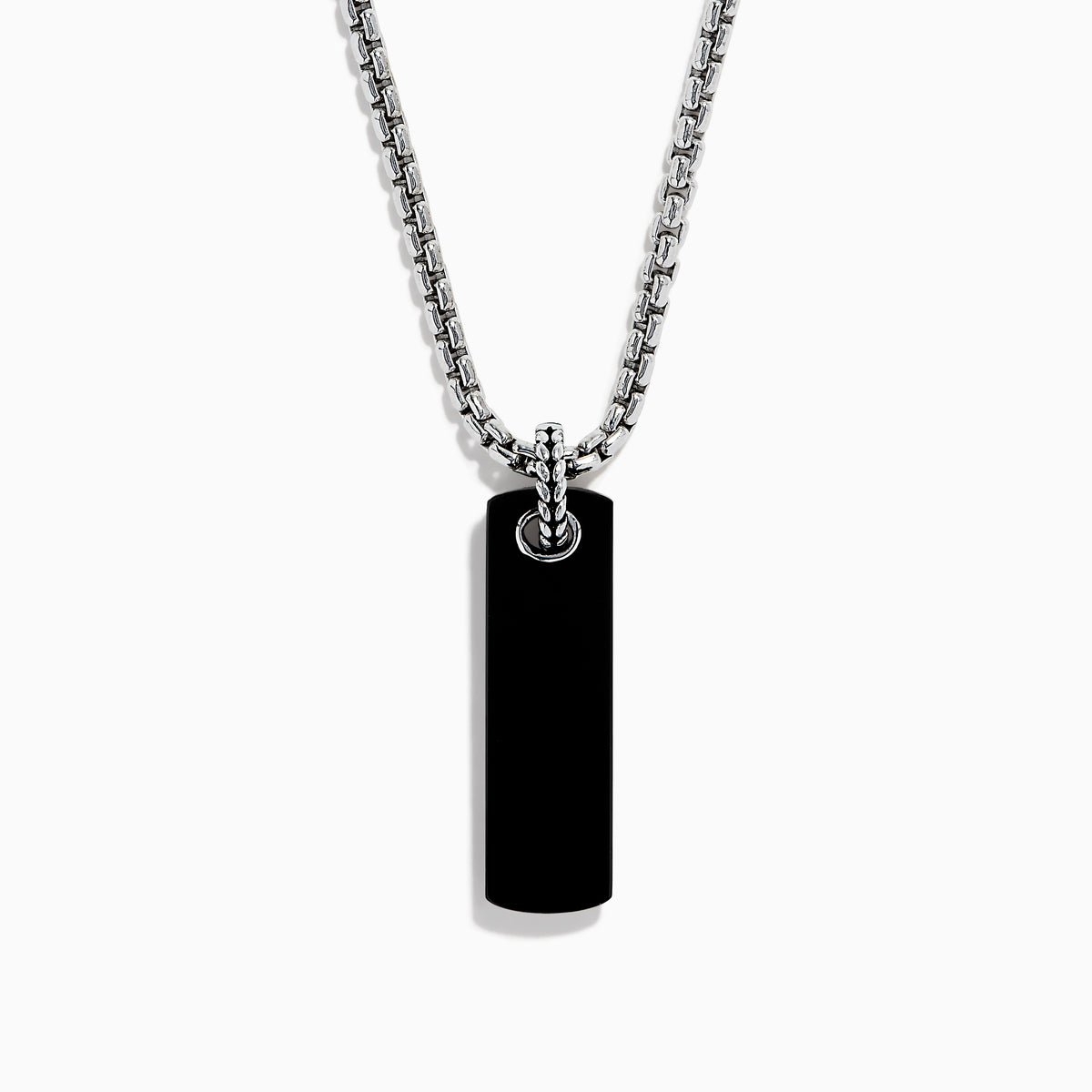 The Men's Sterling Silver Onyx Dog Tag Pendant features a simple rectangular onyx set in sterling silver, suspended from a chain and displayed against a plain white background.