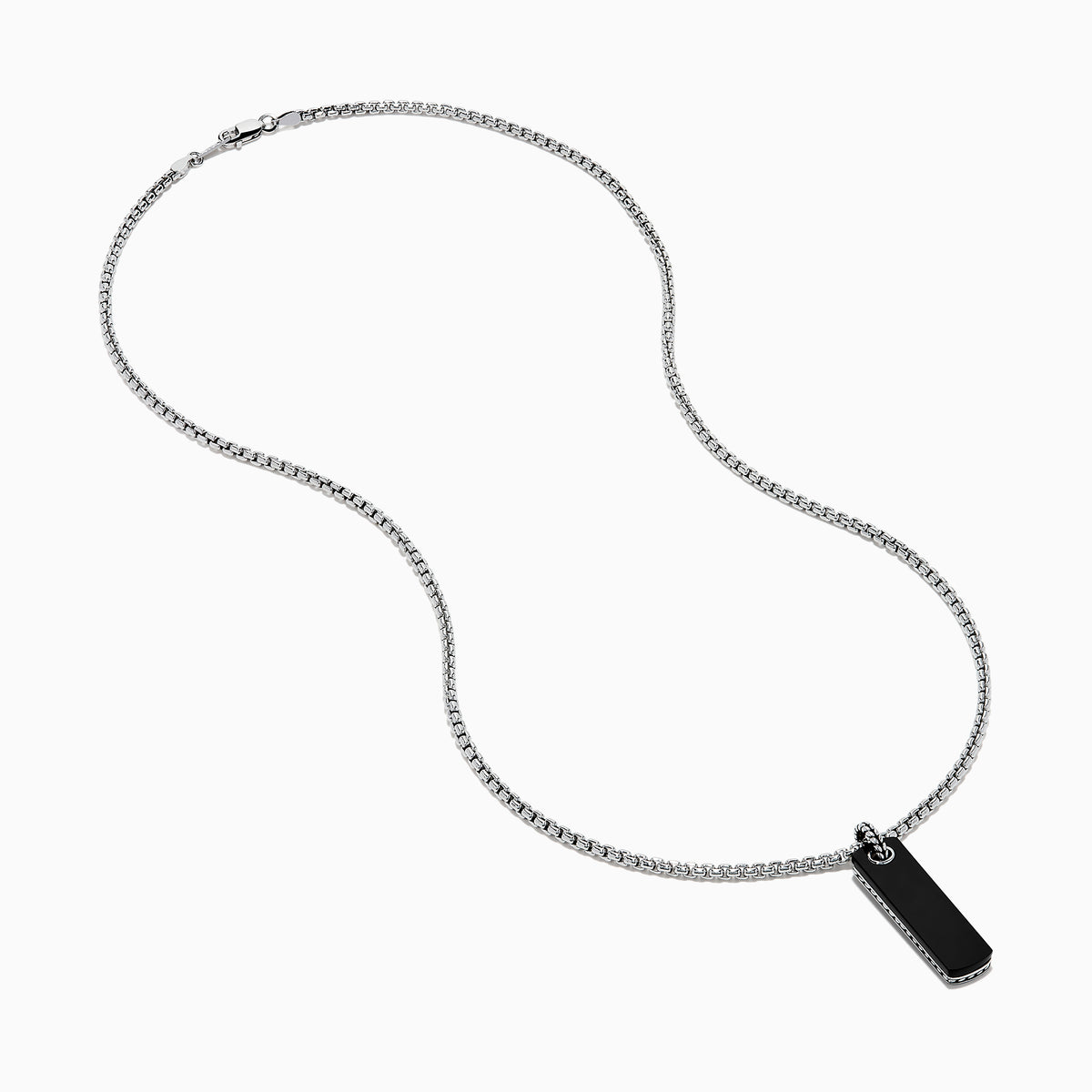 The Men's Sterling Silver Onyx Dog Tag Pendant features a simple rectangular onyx set in sterling silver, suspended from a chain and displayed against a plain white background.