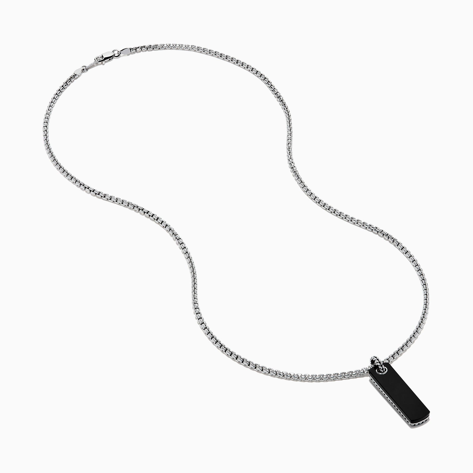The Men's Sterling Silver Onyx Dog Tag Pendant features a simple rectangular onyx set in sterling silver, suspended from a chain and displayed against a plain white background.