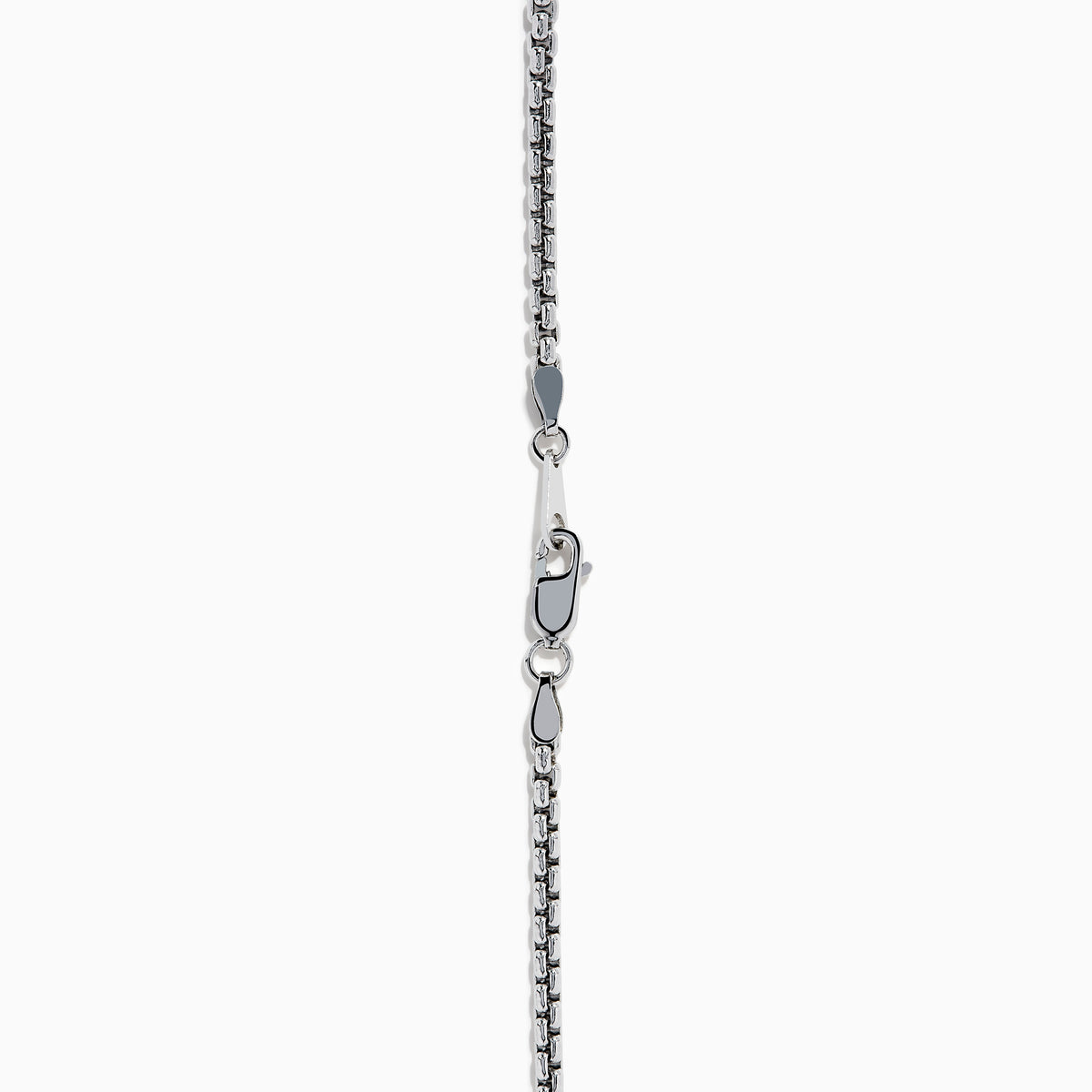 The Men's Sterling Silver Onyx Dog Tag Pendant features a simple rectangular onyx set in sterling silver, suspended from a chain and displayed against a plain white background.