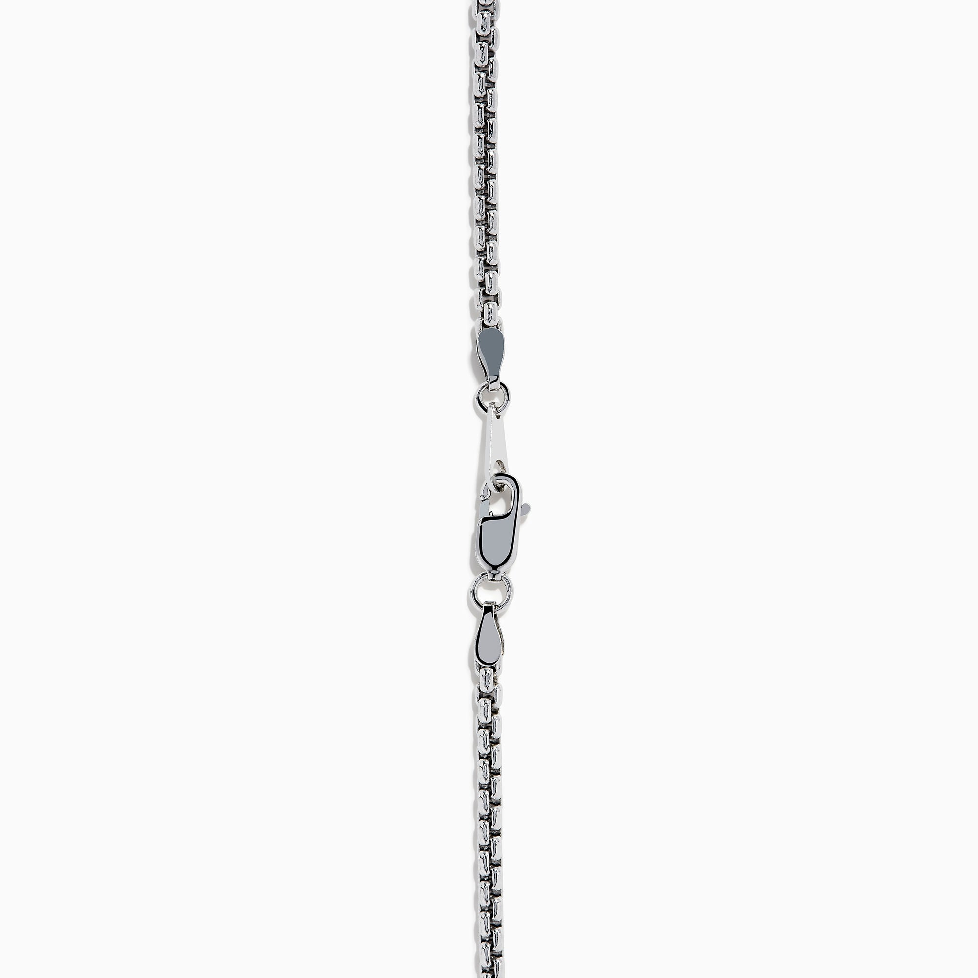 The Men's Sterling Silver Onyx Dog Tag Pendant features a simple rectangular onyx set in sterling silver, suspended from a chain and displayed against a plain white background.