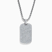 The Mens 925 Sterling Silver White Sapphire Dog Tag Pendant showcases a rectangular pendant adorned with sparkling white sapphires, suspended from a sleek, box-link sterling silver chain.