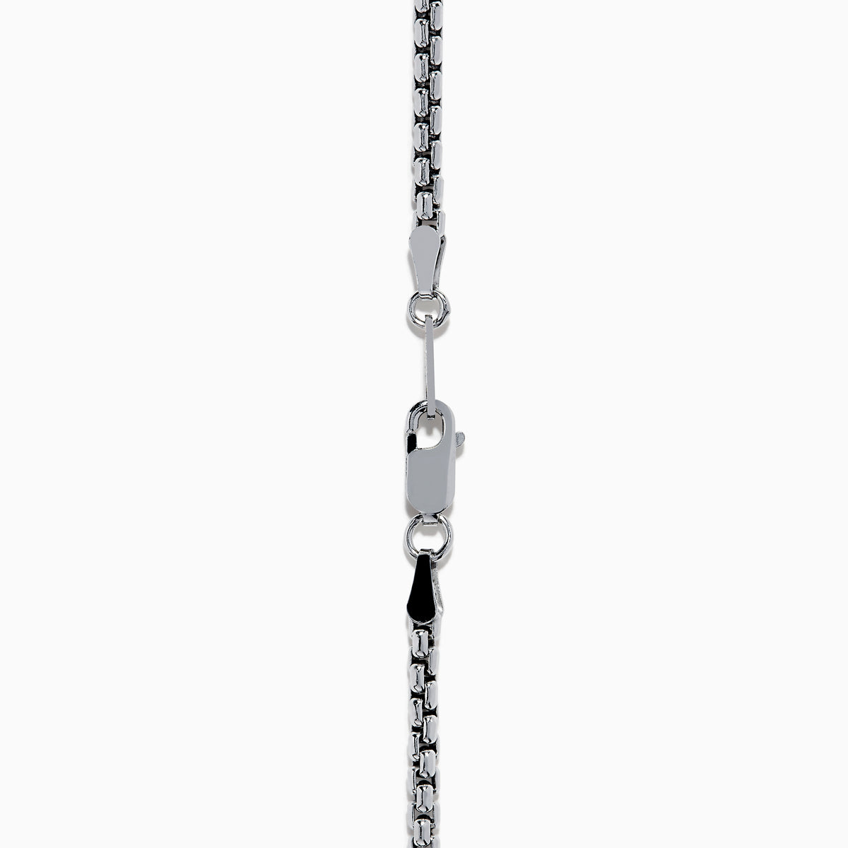 The Mens 925 Sterling Silver Onyx Pendant features a silver chain and a rectangular onyx pendant framed in silver, with a gold border and small gold studs accenting the top and bottom edges.