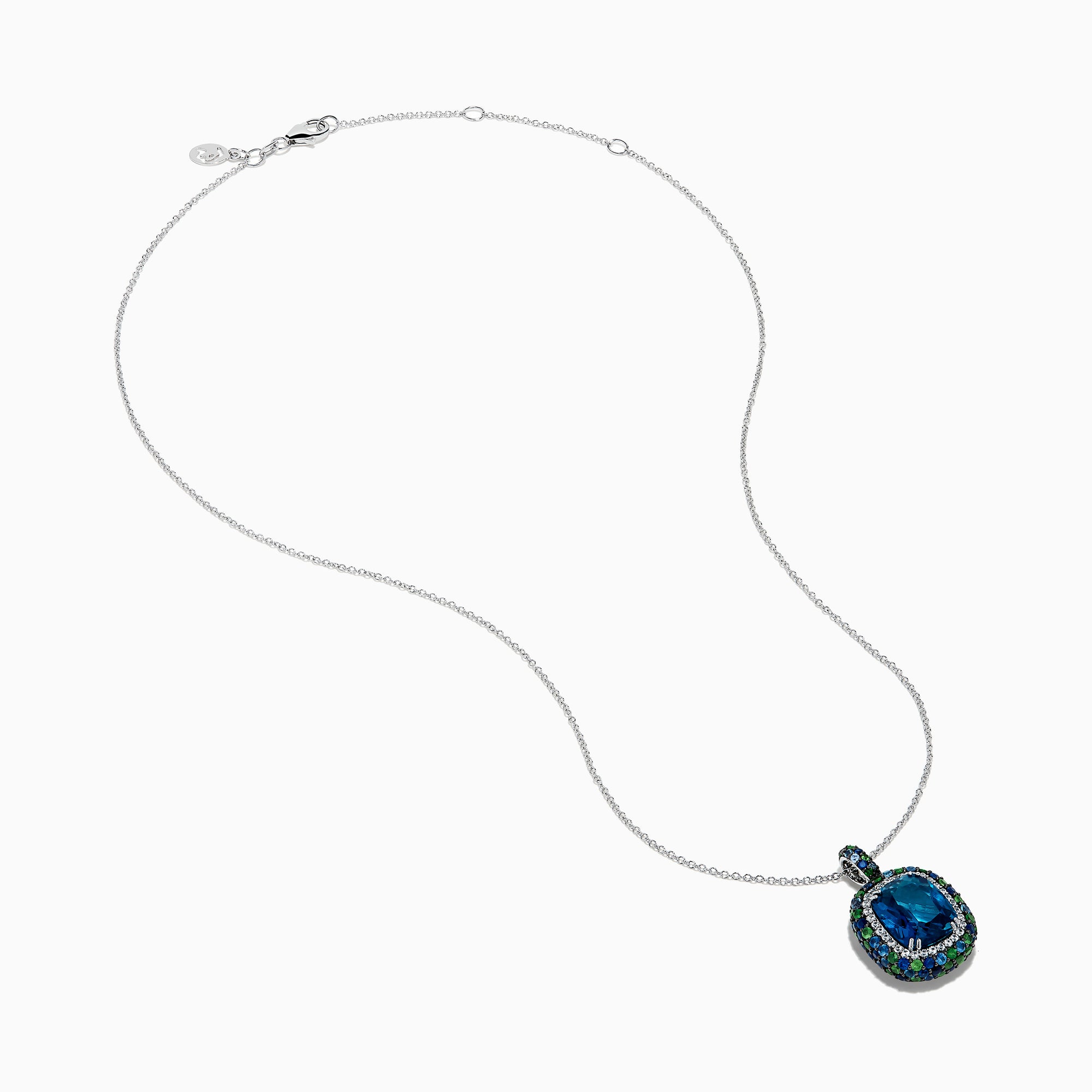 The 925 Sterling Silver Blue Topaz Cushion Multi Gemstone Halo Pendant features a cushion-cut blue topaz, accented by small blue and green stones in a striking halo design.