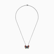 The Nature Sterling Silver Multi Sapphires Butterfly Pendant features a butterfly design with red, blue, and green sapphires, showcased on a white background.