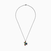 The 925 Seaside Sterling Silver Multi Sapphires Turtle Pendant is a striking chain necklace showcasing a detailed turtle pendant set with vibrant blue, green, yellow, orange, and red sapphires for an eye-catching look.