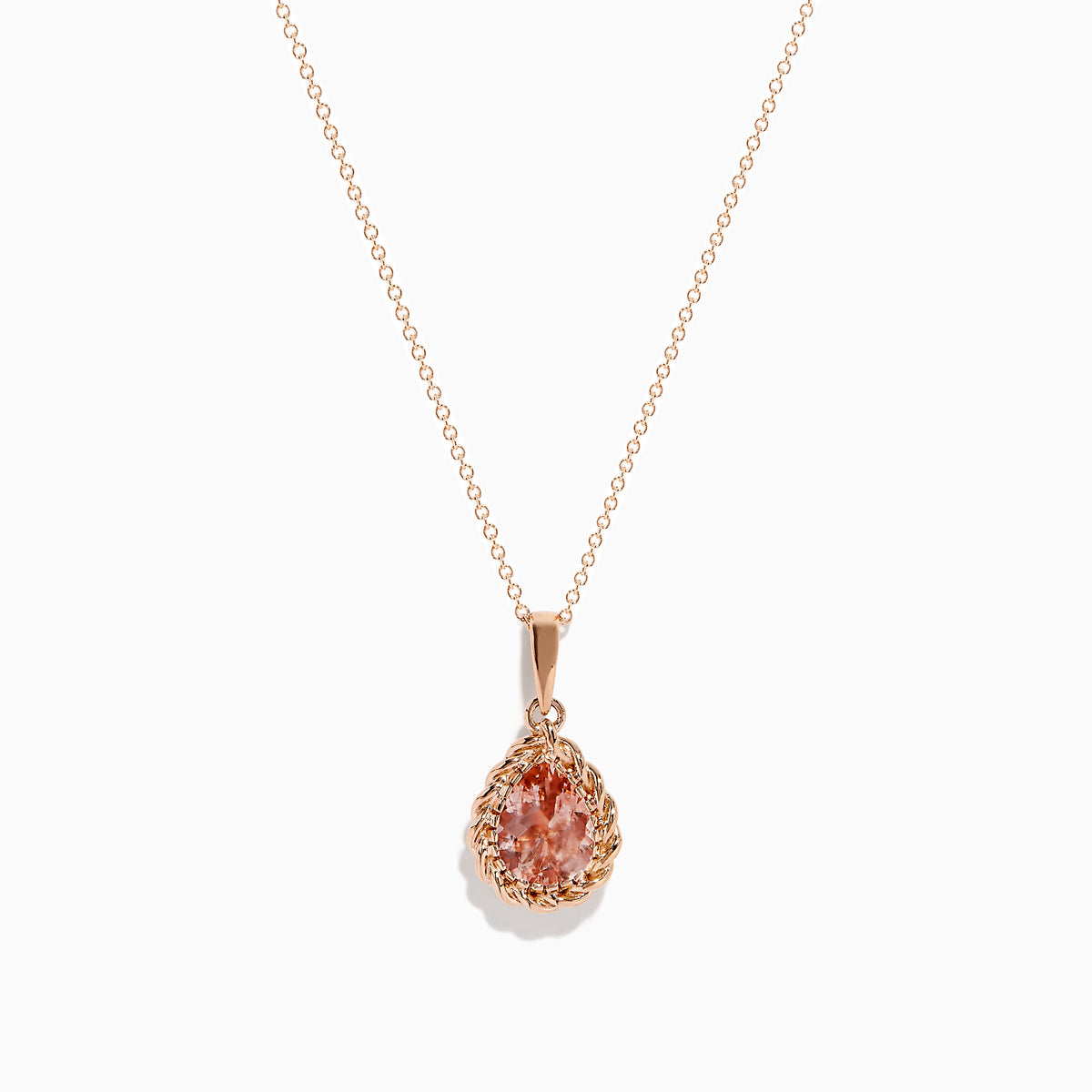 The Blush 14K Rose Gold Morganite Pendant features a teardrop morganite set in intricate rose gold on a delicate chain, shown against a white background.