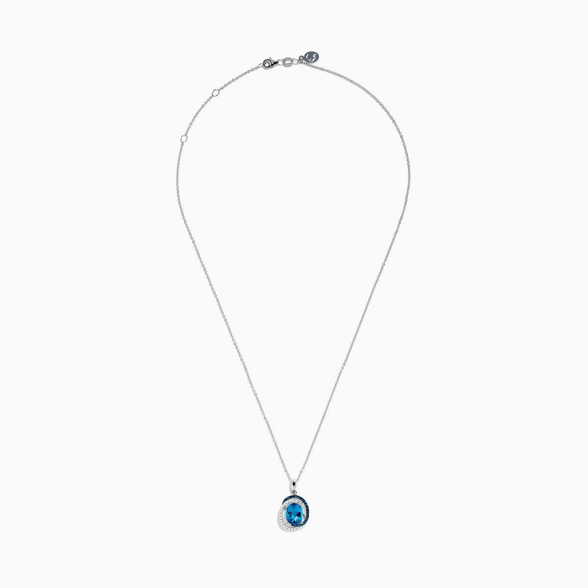 The Ocean Bleu 14K White Gold Pendant features a large blue topaz accented with swirling halos of blue and white diamonds, creating an elegant and eye-catching design.