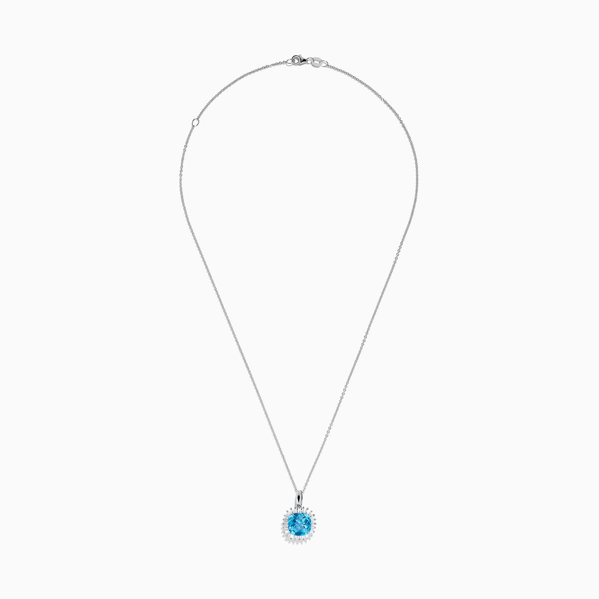 The 14K White Gold Blue Topaz and Diamond Pendant features a square-cut blue topaz accented by a halo of sparkling diamonds, all suspended from a delicate chain.