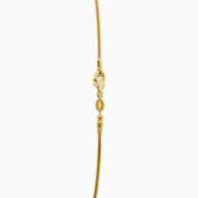 The Mosaic 14K Yellow Gold Multi Color Gemstone and Diamond Pendant features a thin gold chain with a round, barrel-shaped pendant set in a vibrant mosaic of red, purple, orange, green, and blue gemstones.