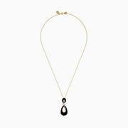 The Eclipse 14K Yellow Gold Onyx and Diamond Pendant features two linked onyx teardrops framed by sparkling diamonds, displayed on a yellow gold chain against a plain white background.