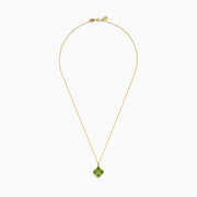 The 14K Yellow Gold Peridot and Diamond Pendant features four peridots in a floral design around a central diamond, presented on a white background.
