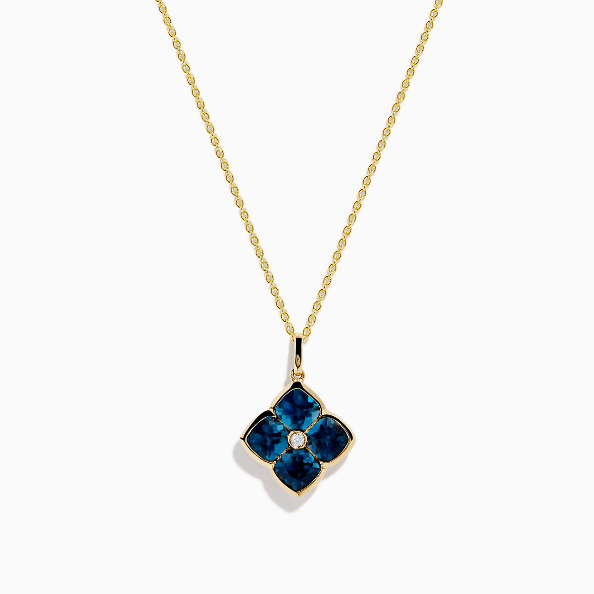 The Ocean Bleu 14K Yellow Gold London Blue Topaz and Diamond Pendant features a clover-shaped design with four London Blue Topaz gemstones and a central diamond on a yellow gold chain necklace.