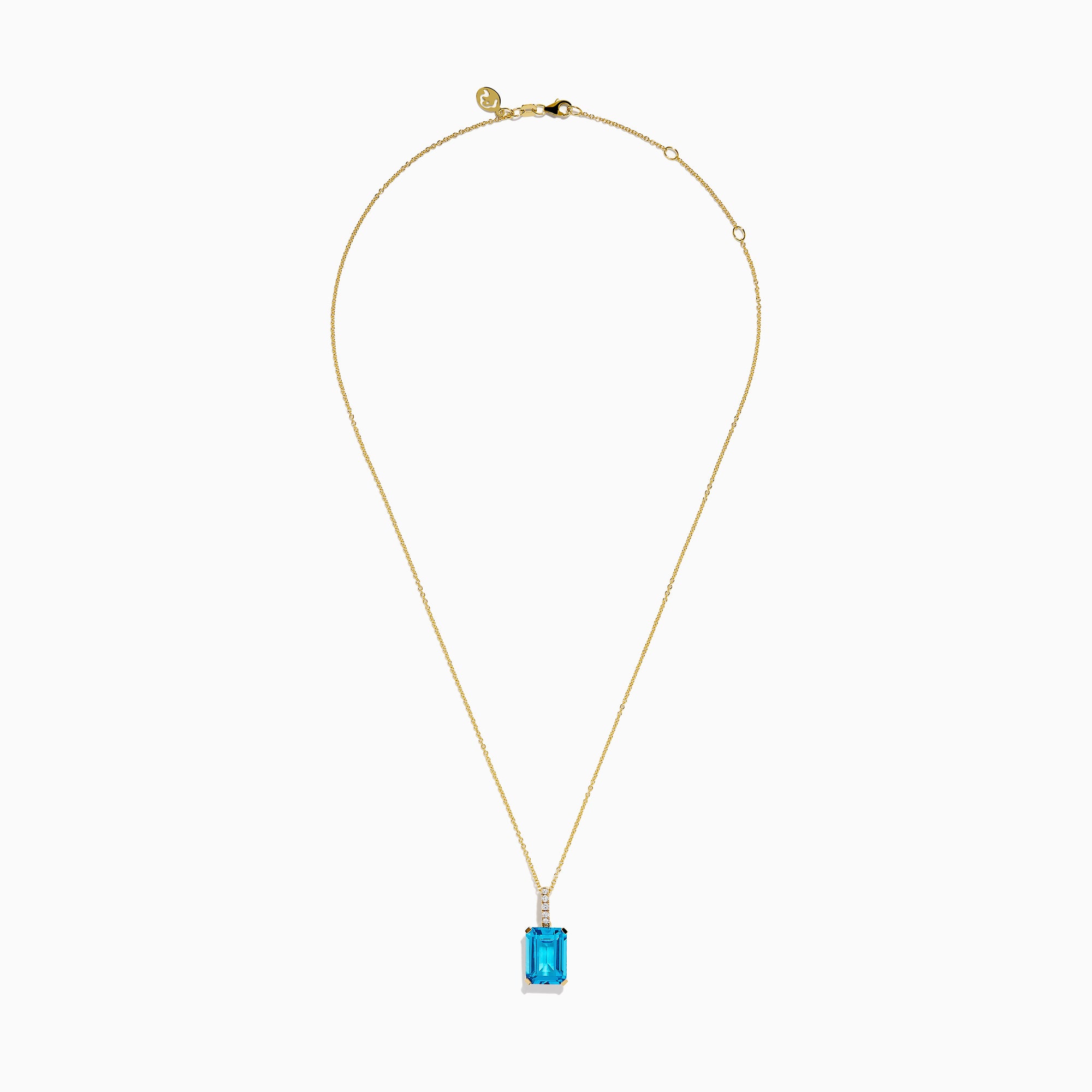 The 14K Yellow Gold Blue Topaz and Diamond Pendant features a large emerald-cut blue topaz accented by a vertical row of sparkling white diamonds for an elegant, polished look.