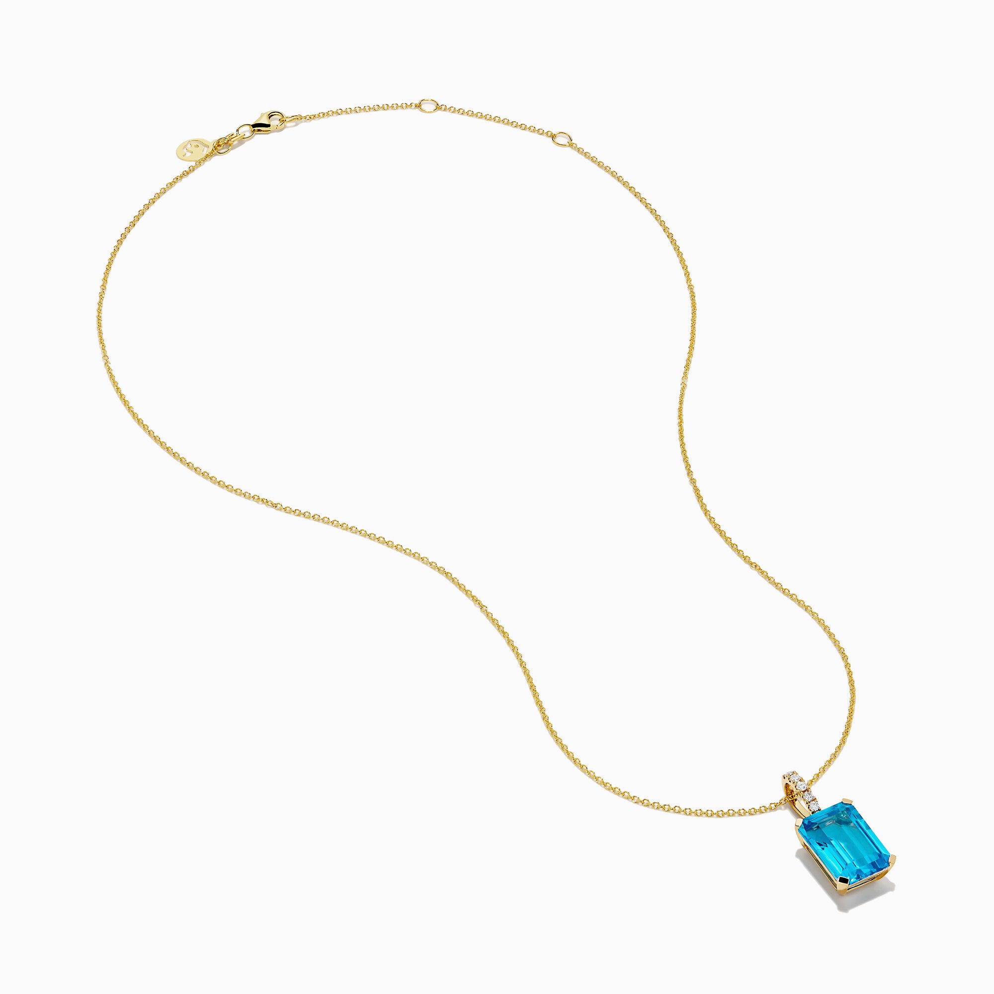 The 14K Yellow Gold Blue Topaz and Diamond Pendant features a large emerald-cut blue topaz accented by a vertical row of sparkling white diamonds for an elegant, polished look.