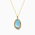 A 14K yellow gold pendant necklace featuring a sky blue topaz and mother of pearl doublet, displayed against a plain white background.