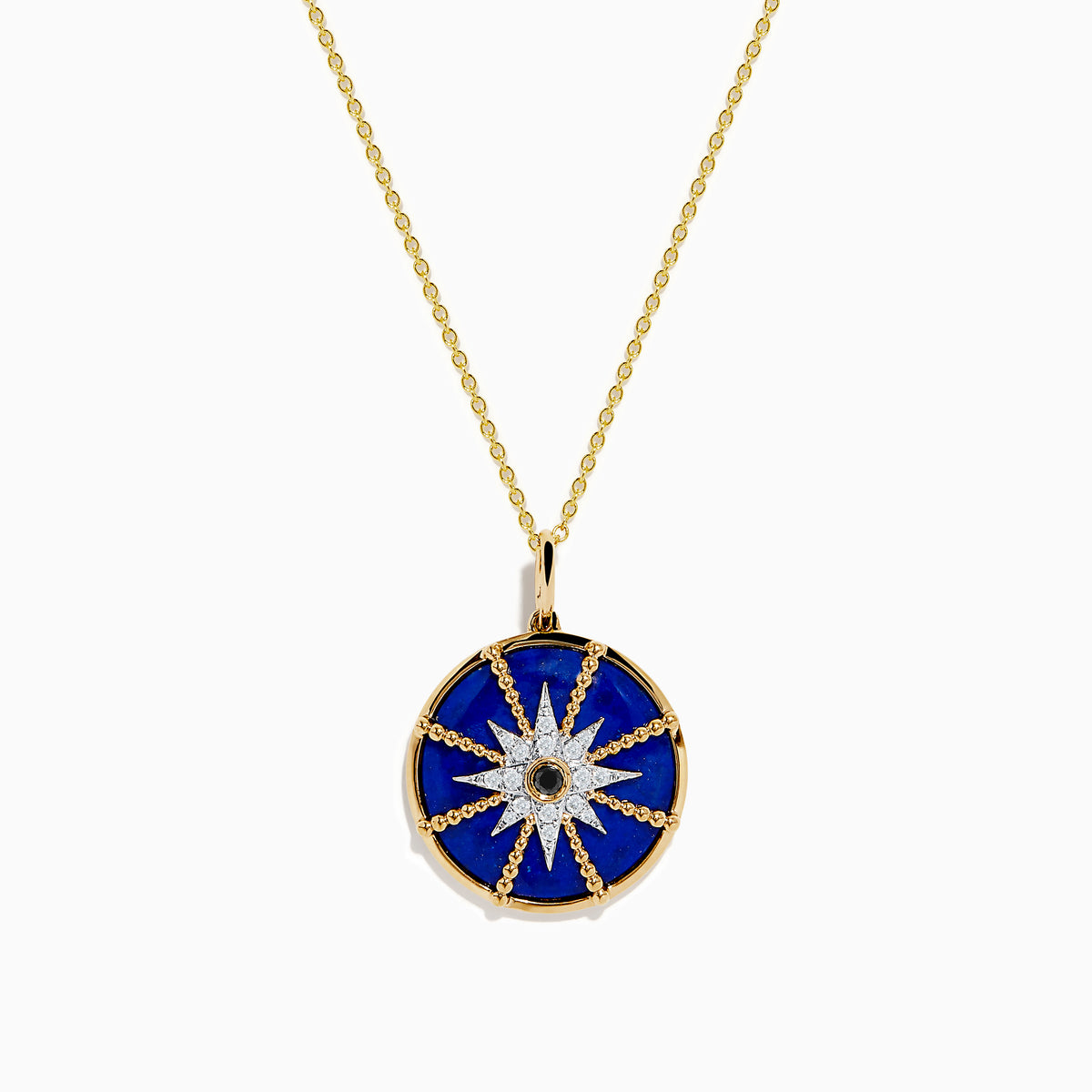 A 14K yellow gold pendant featuring a round blue lapis stone with a white and black diamond compass design—a striking addition to your jewelry collection.