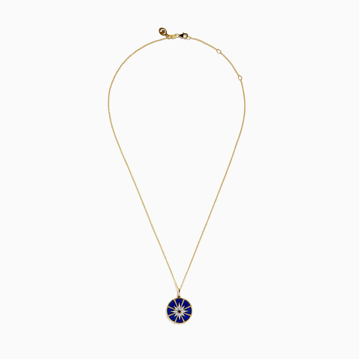 A 14K yellow gold pendant featuring a round blue lapis stone with a white and black diamond compass design—a striking addition to your jewelry collection.