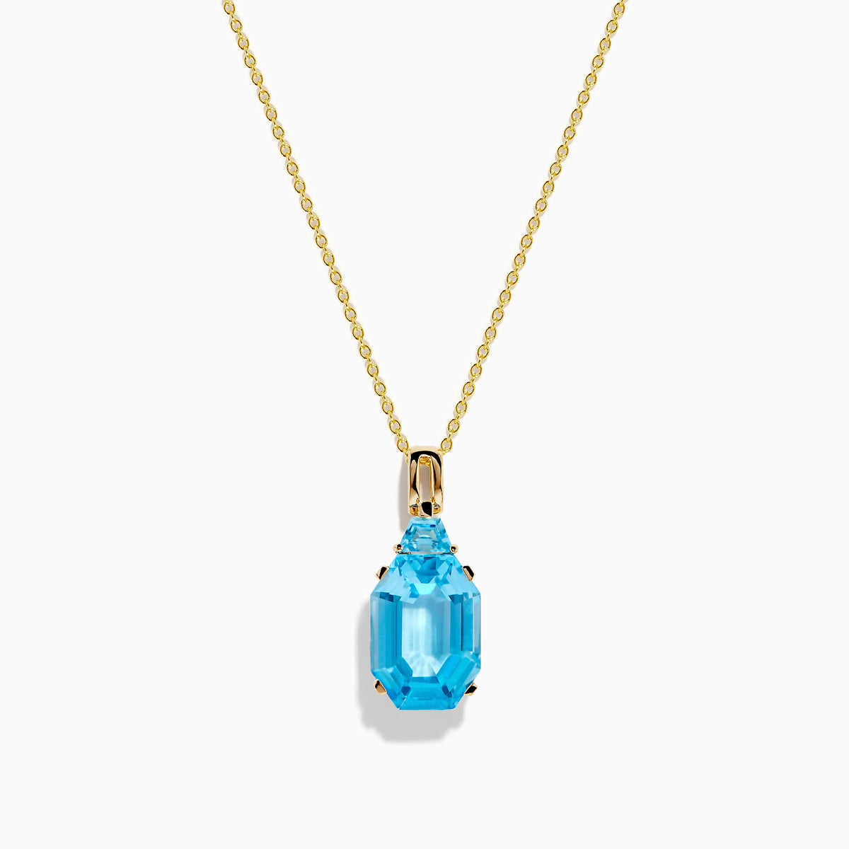 The Ocean Bleu 14K Yellow Gold Blue Topaz Pendant features an emerald-cut blue topaz in gold prongs, showcased on a gold chain against a white background.