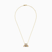 A 14K yellow gold necklace features a bee-shaped pendant adorned with black diamond and freshwater pearl, displayed on a plain white background.
