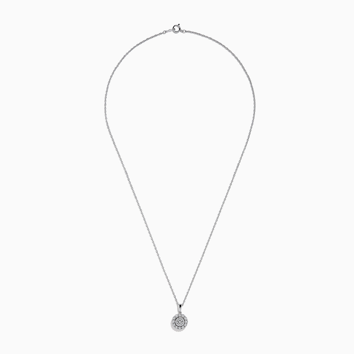 The Sterling Silver Diamond Cluster Pendant showcases a round center diamond encircled by two halos of smaller diamonds, all set in sterling silver, and is displayed on a white background.