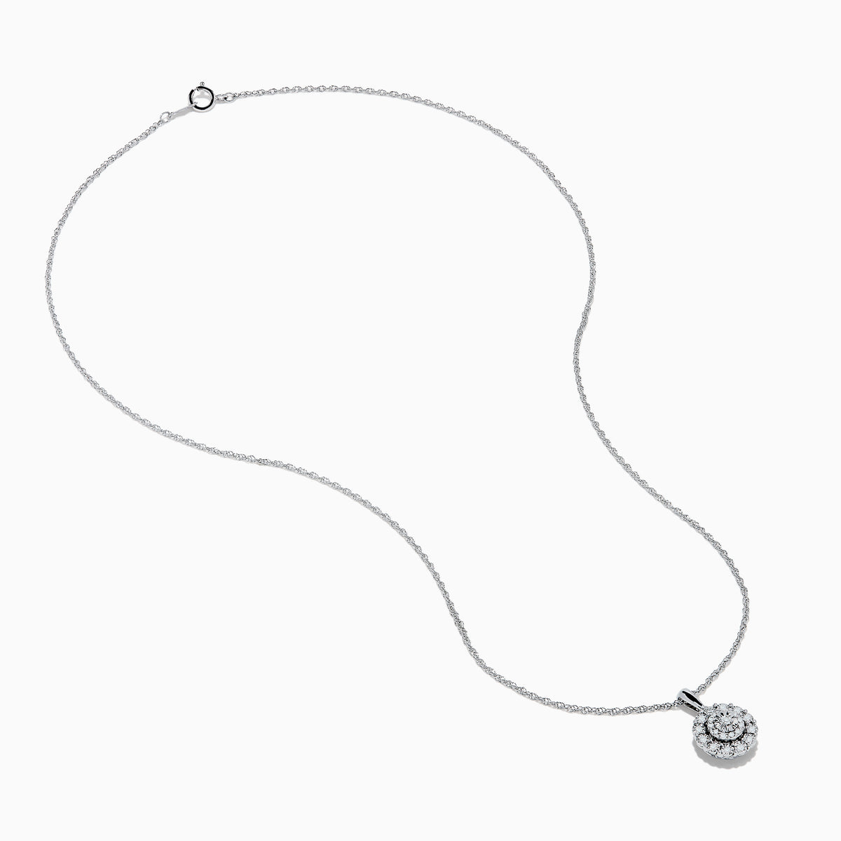 The Sterling Silver Diamond Cluster Pendant showcases a round center diamond encircled by two halos of smaller diamonds, all set in sterling silver, and is displayed on a white background.