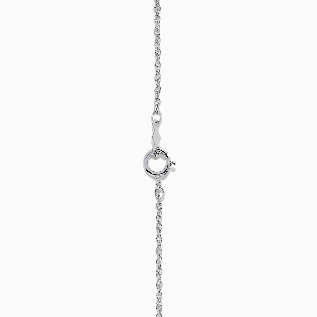 The Sterling Silver Diamond Cluster Pendant showcases a round center diamond encircled by two halos of smaller diamonds, all set in sterling silver, and is displayed on a white background.