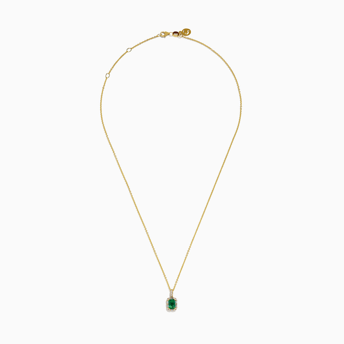 The Brasilica 18K Yellow Gold Emerald and Diamond Pendant features an emerald-cut green gemstone surrounded by small diamonds, showcased on a chain against a plain white background.