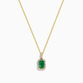 The Brasilica 18K Yellow Gold Emerald and Diamond Pendant features an emerald-cut green gemstone surrounded by small diamonds, showcased on a chain against a plain white background.