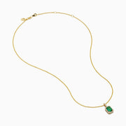 The Brasilica 18K Yellow Gold Emerald and Diamond Pendant features an emerald-cut green gemstone surrounded by small diamonds, showcased on a chain against a plain white background.