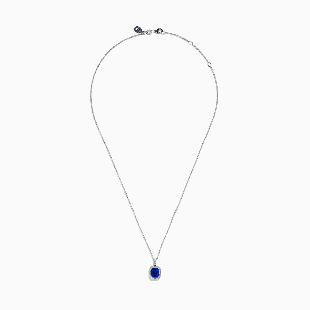 The Effy Hematian 18K White Gold Sapphire and Diamond Halo Pendant features a cushion-cut deep blue sapphire surrounded by sparkling diamonds, showcased on a plain white background.