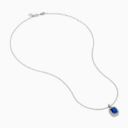 The Effy Hematian 18K White Gold Sapphire and Diamond Halo Pendant features a cushion-cut deep blue sapphire surrounded by sparkling diamonds, showcased on a plain white background.