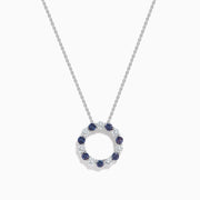 The Effy Hematian 14K White Gold Alexandrite and Diamond Circle Pendant features alternating dark blue alexandrite and clear gemstones in a circular design, shown against a plain white background.