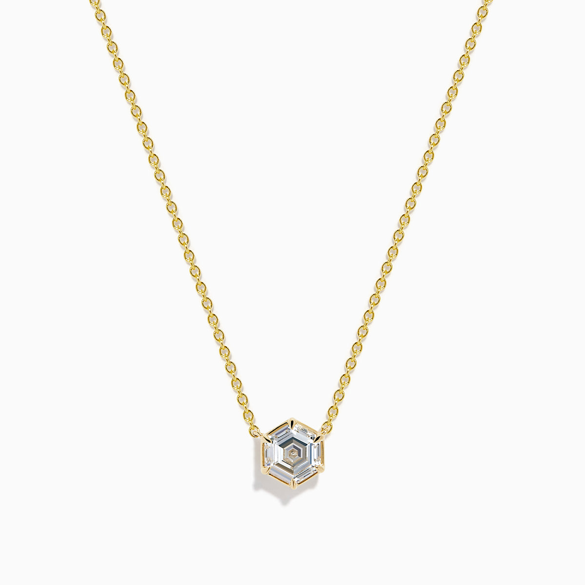 Elevate your style with the Lab Grown Diamond 2.00ct Hexagon Solitaire Necklace in 14K Yellow Gold, featuring a striking hexagonal-shaped pendant set with a clear lab-grown diamond at its center. Displayed on a white background, this elegant necklace is perfect for adding a touch of modern sophistication to any ensemble.