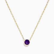 The 14K Yellow Gold Amethyst Bezel Paperclip Chain Pendant features a round, faceted amethyst set in a minimalist bezel on a delicate paperclip chain.