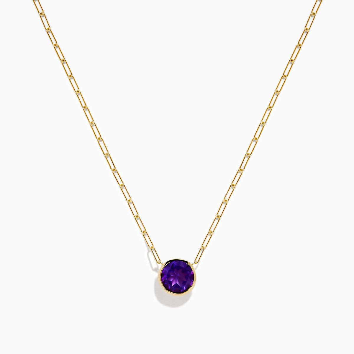 The 14K Yellow Gold Amethyst Bezel Paperclip Chain Pendant features a round, faceted amethyst set in a minimalist bezel on a delicate paperclip chain.