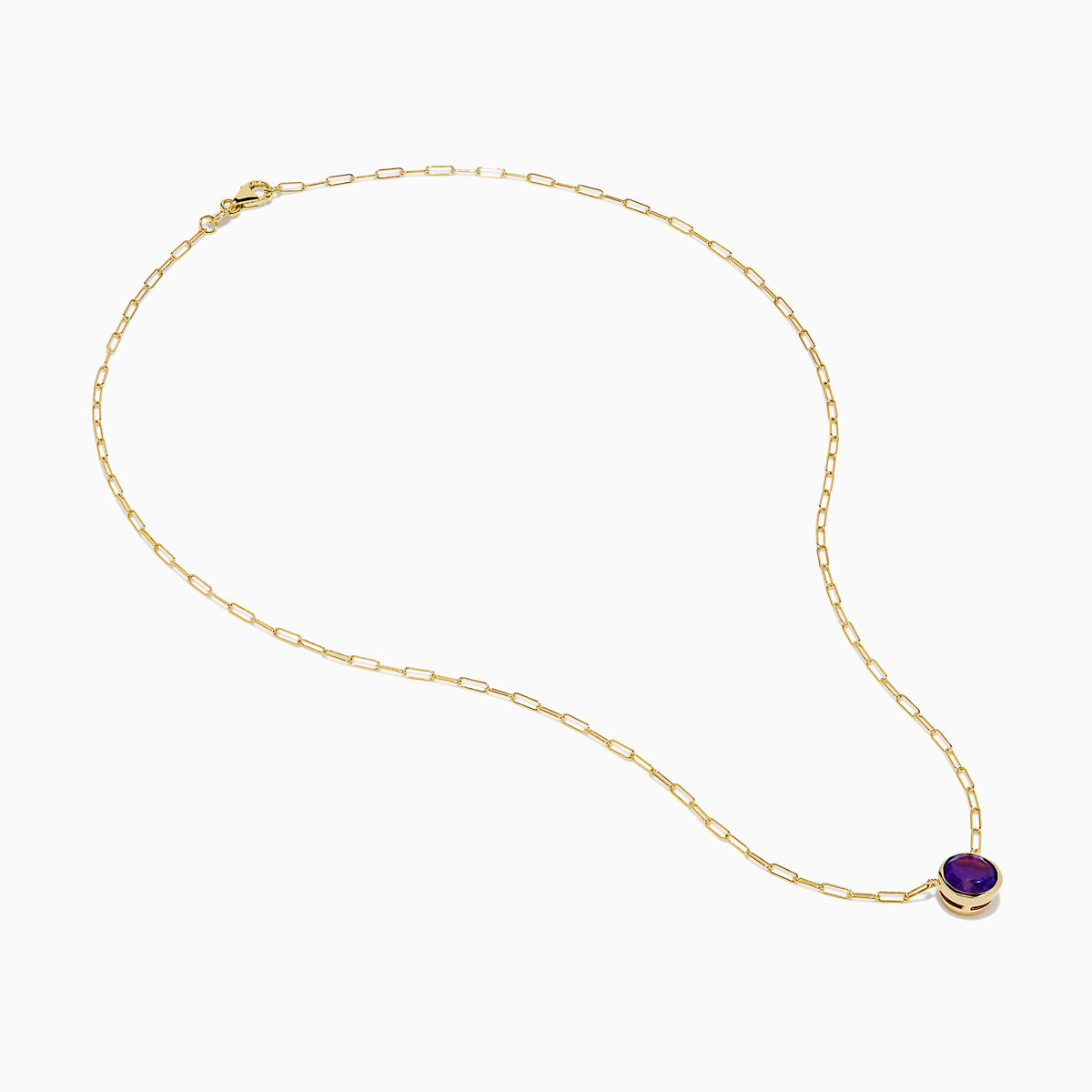 The 14K Yellow Gold Amethyst Bezel Paperclip Chain Pendant features a round, faceted amethyst set in a minimalist bezel on a delicate paperclip chain.
