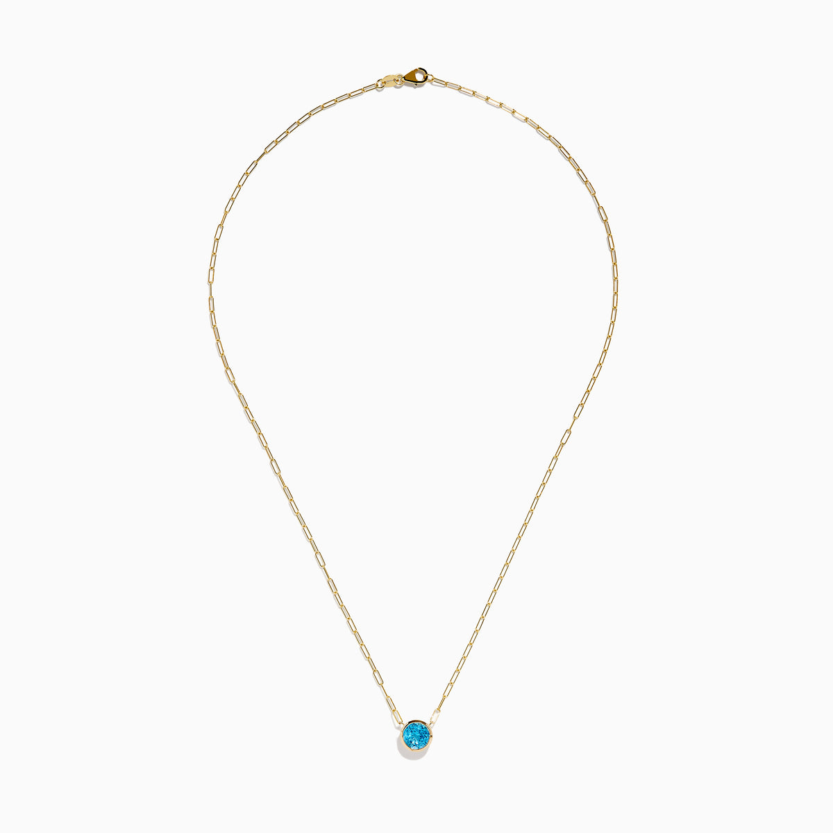 The 14K Yellow Gold Blue Topaz Bezel Paperclip Chain Pendant features a single round blue topaz gemstone on a gold paperclip chain, beautifully displayed against a white background.