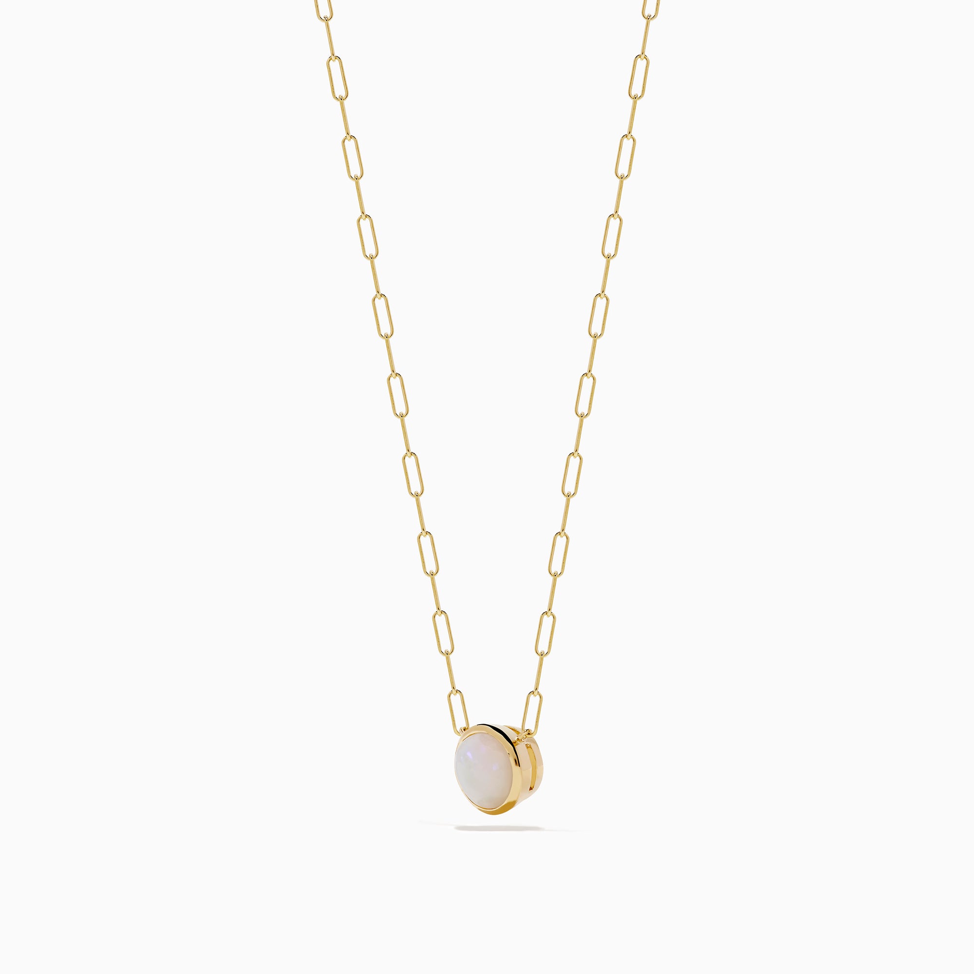 The 14K Yellow Gold Opal Bezel Paperclip Chain Pendant features a single round white opal in a simple, elegant bezel setting on a delicate yellow gold chain.