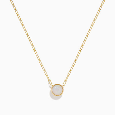 The 14K Yellow Gold Opal Bezel Paperclip Chain Pendant features a single round white opal in a simple, elegant bezel setting on a delicate yellow gold chain.