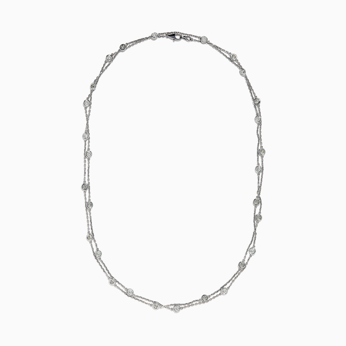 The 14K White Gold 36 Inch 3.00ct Diamond Station Necklace features a white gold chain with evenly spaced round bezel-set diamonds for a timeless, elegant look.
