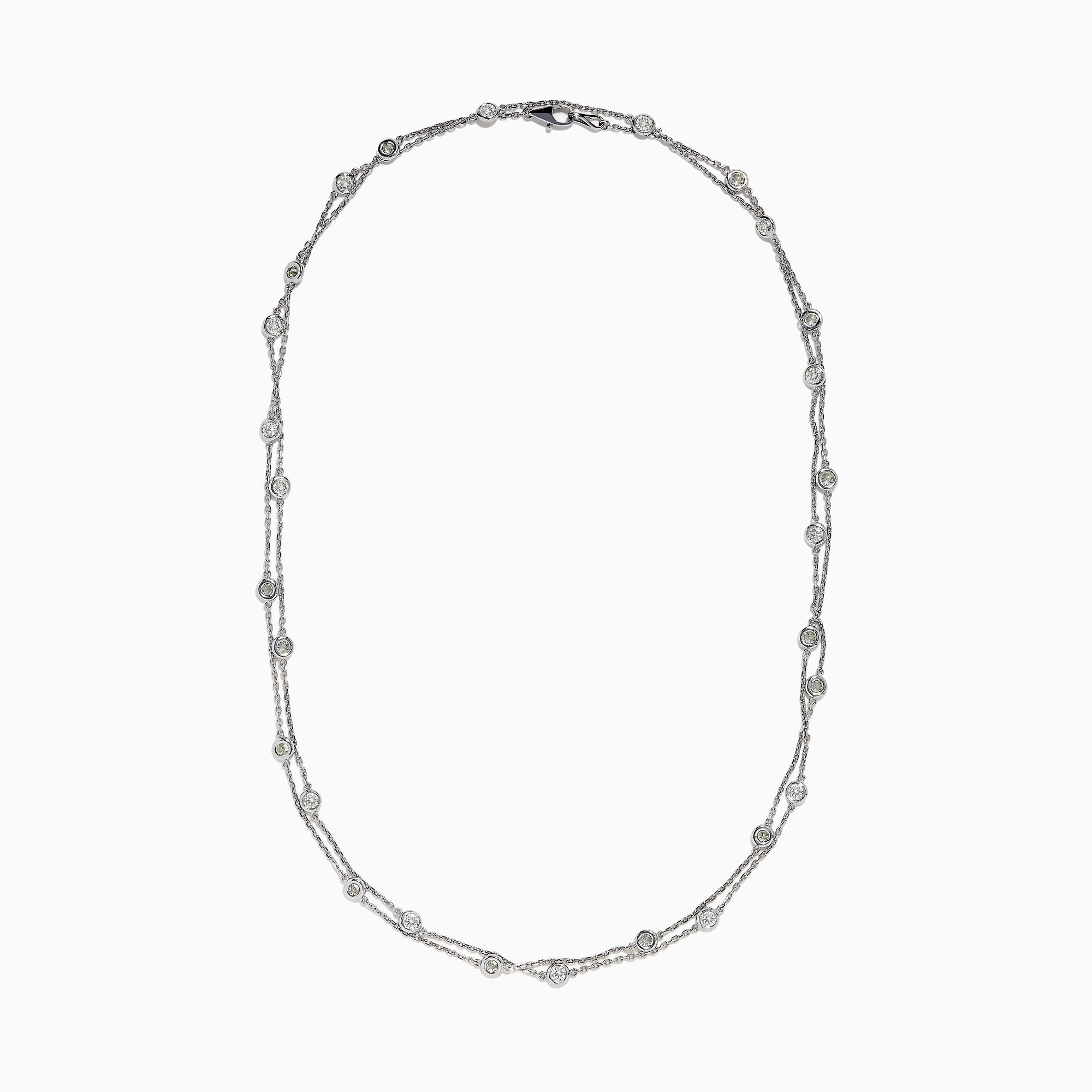 The 14K White Gold 36 Inch 3.00ct Diamond Station Necklace features a white gold chain with evenly spaced round bezel-set diamonds for a timeless, elegant look.