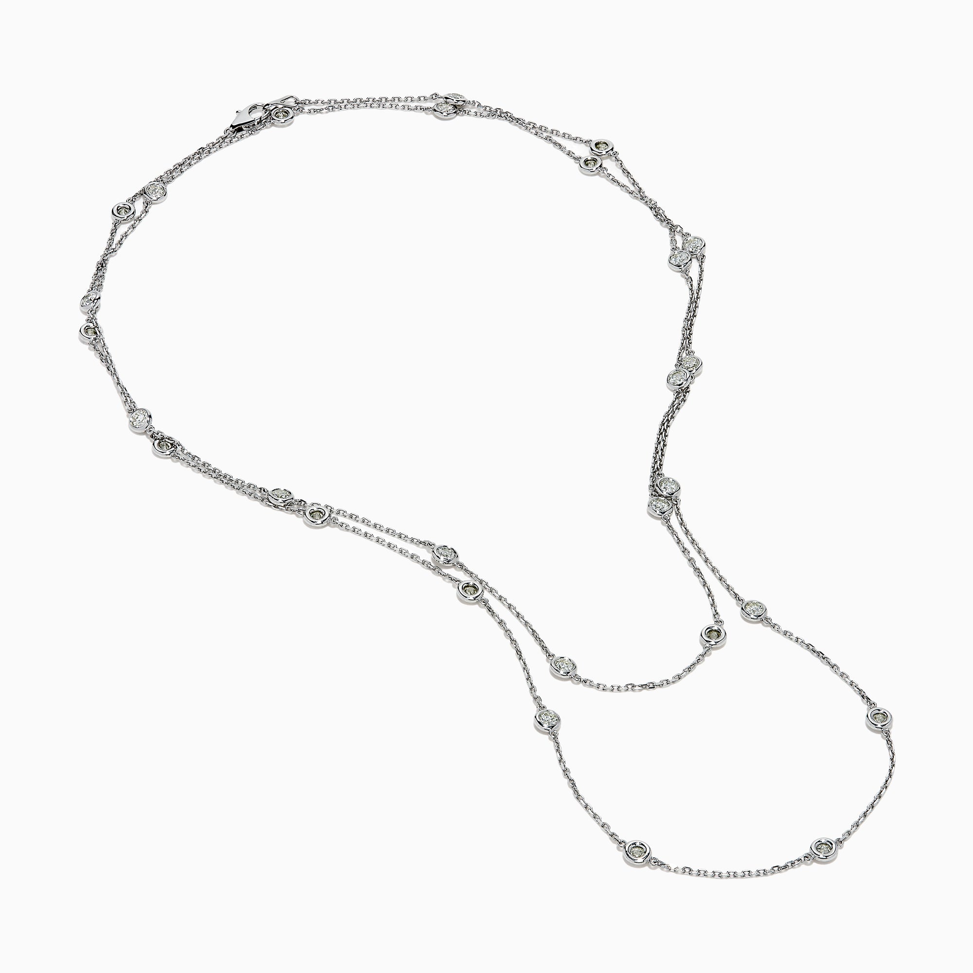 The 14K White Gold 36 Inch 3.00ct Diamond Station Necklace features a white gold chain with evenly spaced round bezel-set diamonds for a timeless, elegant look.