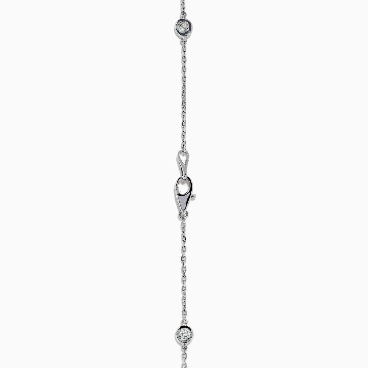 The 14K White Gold 36 Inch 3.00ct Diamond Station Necklace features a white gold chain with evenly spaced round bezel-set diamonds for a timeless, elegant look.