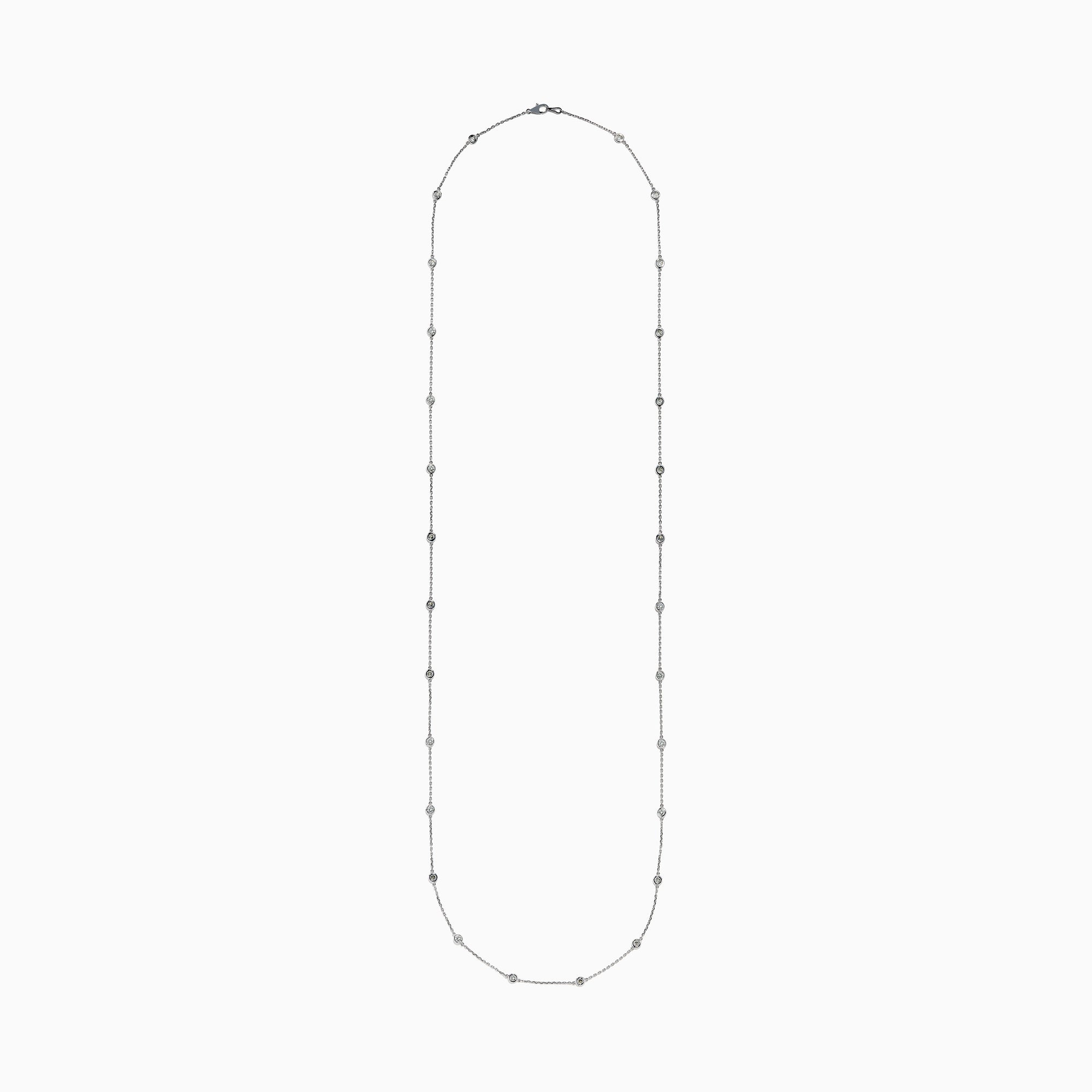The 14K White Gold 36 Inch 3.00ct Diamond Station Necklace features a white gold chain with evenly spaced round bezel-set diamonds for a timeless, elegant look.