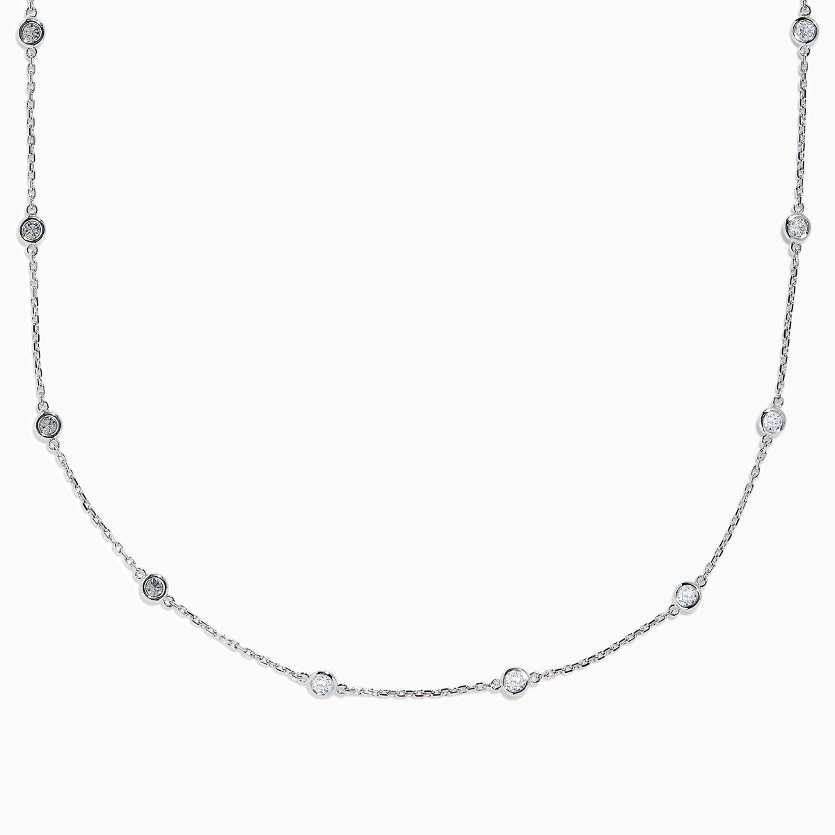 The 14K White Gold Diamond Station Necklace, 1.00 TCW, features evenly spaced round diamonds along a fine chain and is secured with a lobster clasp.
