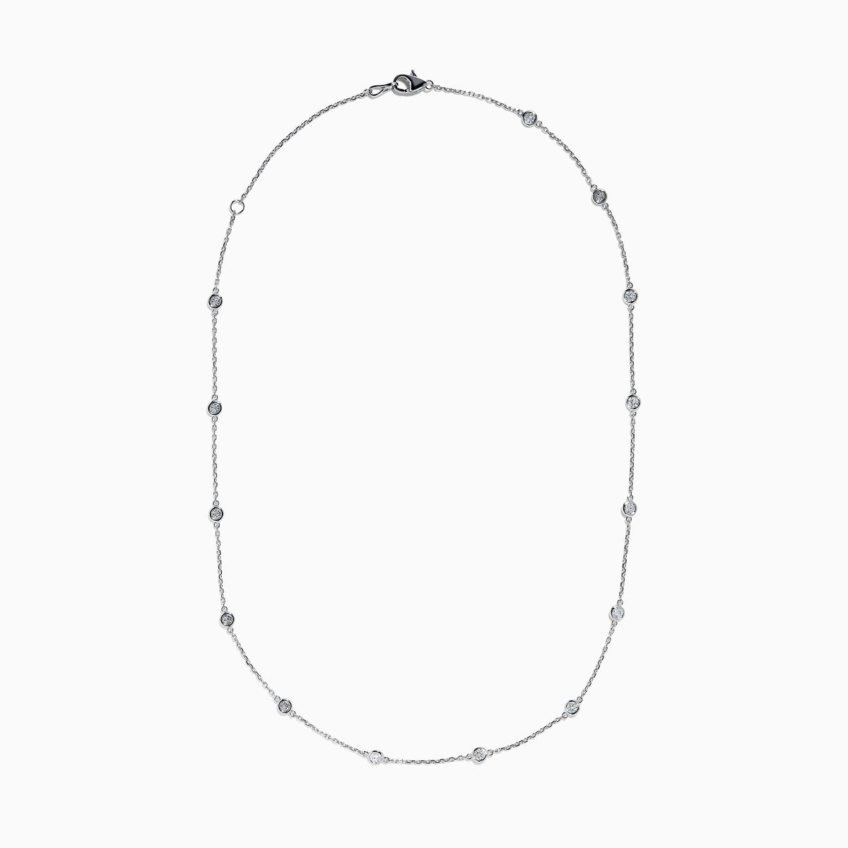 The 14K White Gold Diamond Station Necklace, 1.00 TCW, features evenly spaced round diamonds along a fine chain and is secured with a lobster clasp.